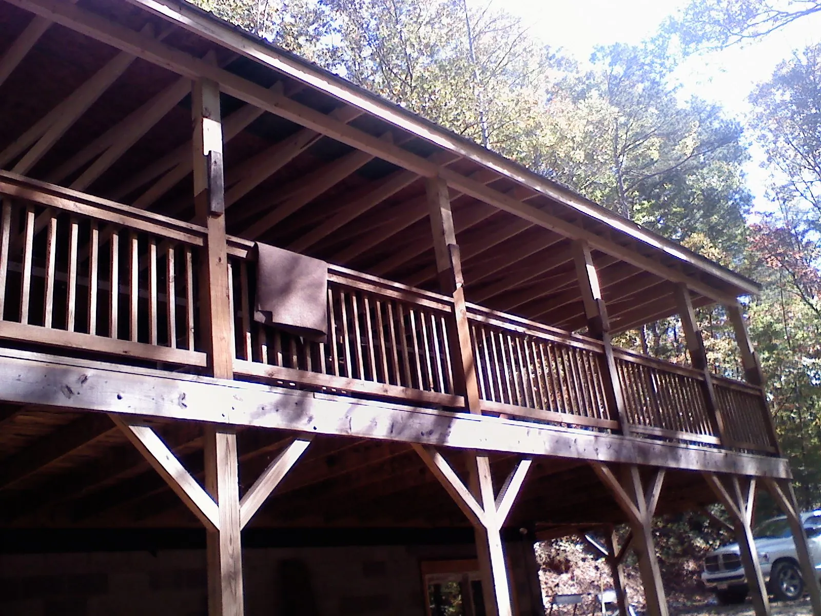 Timber framing under a new elevated porch and deck — Roof Leak Repair in Bottineau by Roofing Brothers